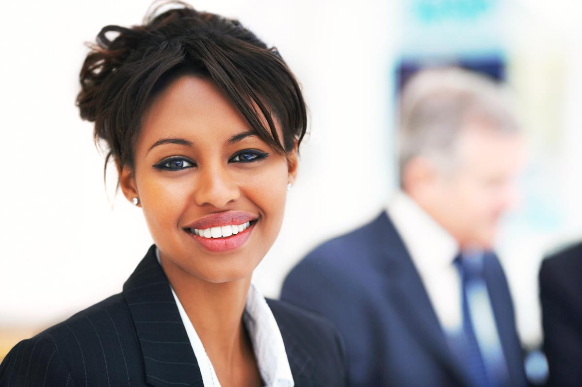 A business woman smiling.